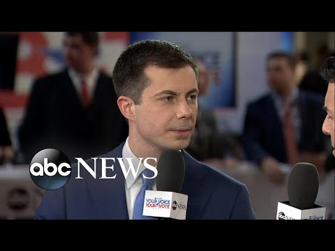 Pete Buttigieg sits in after the New Hampshire debate  | ABC News